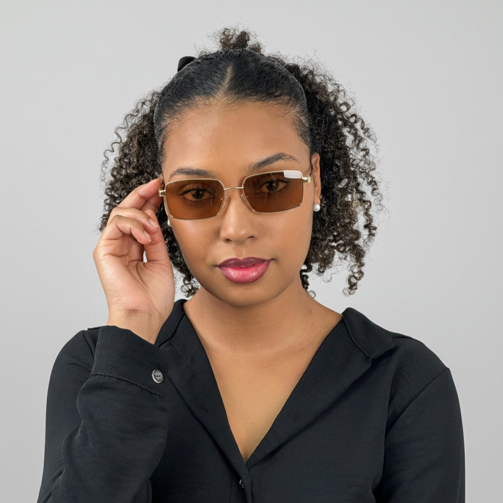 Euglasses Deméter narrow rectangular metal frame sunglasses with brown lenses and UV400 protection.